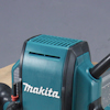 Makita handöverfräs i närbild, med blå och svart design och en ventilerad del upptill.