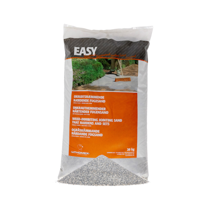 En vit och orange påse med texten "EASY" innehållande hårdnande fogsand.